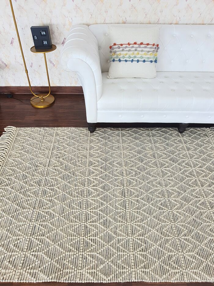 Handcrafted natural white color woven rug with fringes SRN 007 (170x240cm) by Ramsha Home
