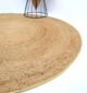 Natural braided jute rugs showcasing eco-friendly design, durability, and timeless rustic charm