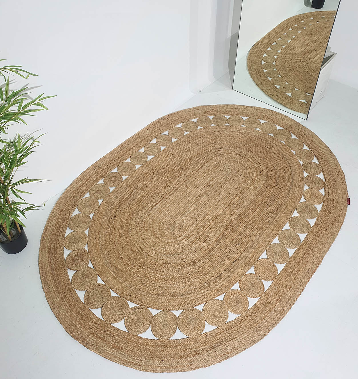 Top View of Handmade Braided Jute Floor Rug: Oval Shape, Natural Color by Ramsha Home Top View of Handmade Braided Jute Floor Rug - Oval Shape, Natural Color by Ramsha Home