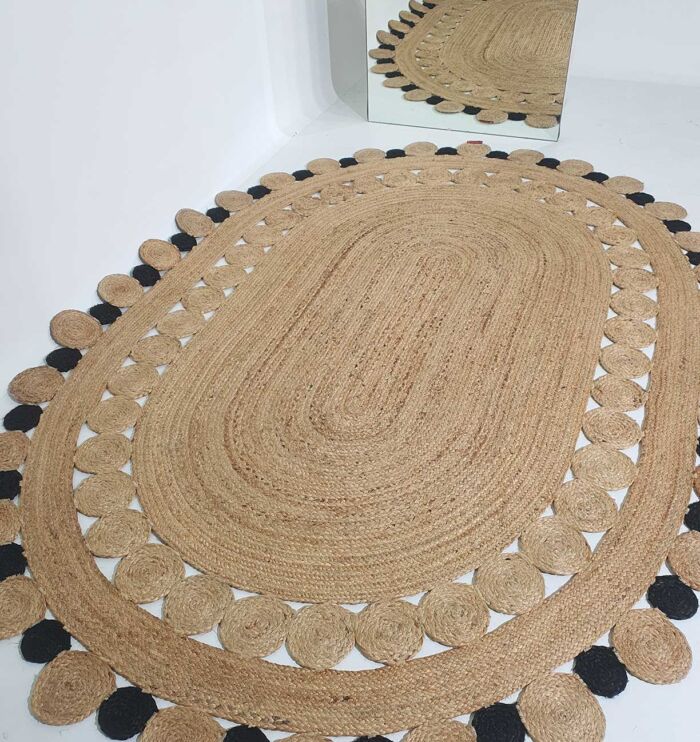 Sideways View Handcrafted Oval Jute Floor Rug - Natural and Black Color, Perfect for Living Room and Bedroom Mat by Ramsha Home