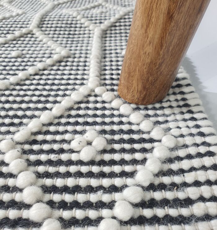 Elegant 170x240cm woven rug in white and black, crafted from wool and cotton, SR 005, ideal for sophisticated home interiors by Ramsha Home.
