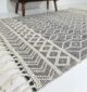 Contemporary 170x240cm woven rug, SR 005, in white and black wool and cotton, designed to add a bold and modern touch to your home decor by Ramsha Home.