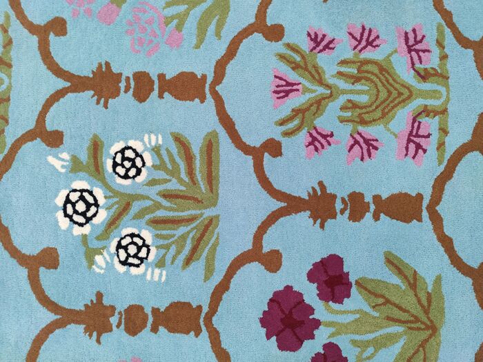 Handmade multi color wool decor rug with intricate patterns