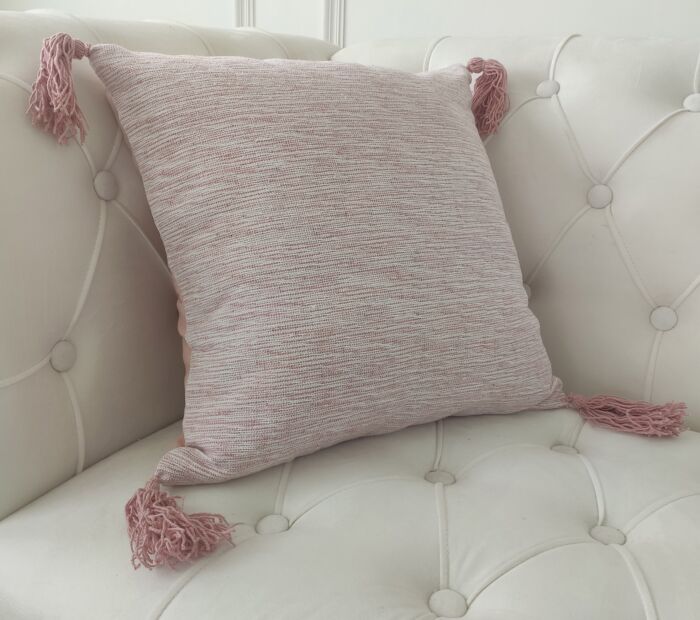 Polyester cushion in pink for sofa or office decor,