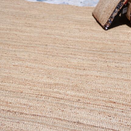 Natural jute rug for indoor and outdoor use, perfect as living room rugs or outdoor rugs in UAE homes.