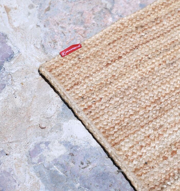 Natural jute rug for indoor and outdoor use, perfect as living room rugs or outdoor rugs in UAE homes.