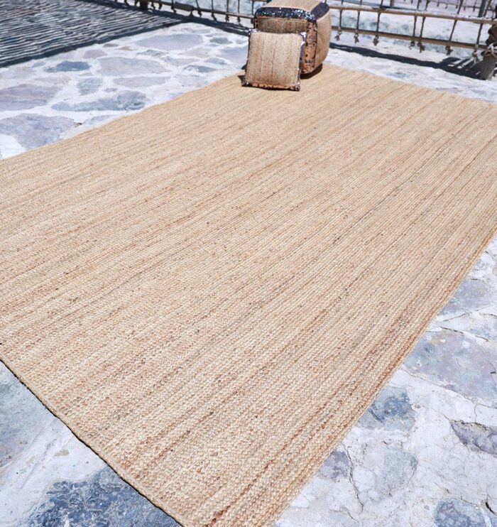 Natural jute rug for indoor and outdoor use, perfect as living room rugs or outdoor rugs in UAE homes.