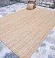 Natural jute rug for indoor and outdoor use, perfect as living room rugs or outdoor rugs in UAE homes.