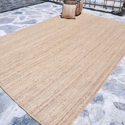 Natural jute rug for indoor and outdoor use, perfect as living room rugs or outdoor rugs in UAE homes.