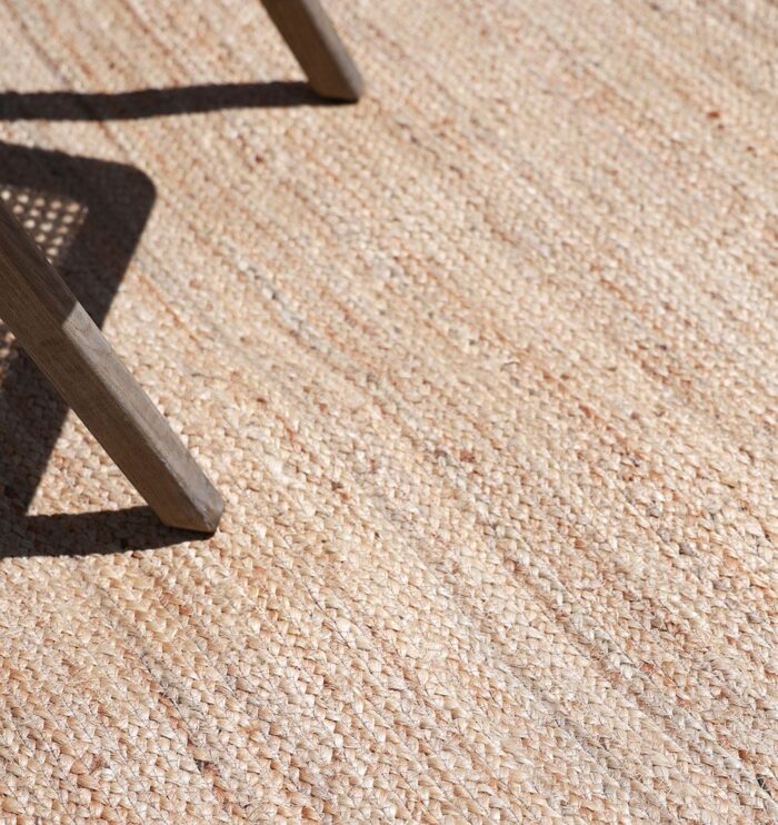 Natural jute rug for indoor and outdoor use, perfect as living room rugs or outdoor rugs in UAE homes.