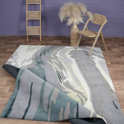 Hand-tufted rug with elegant design, soft texture, and durable craftsmanship for home décor.