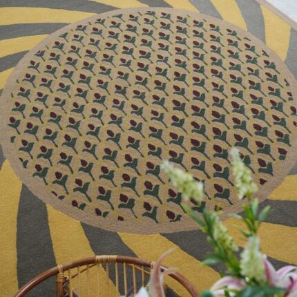 Handmade wool rug with intricate design, soft texture, and timeless decorative appeal for home interiors.