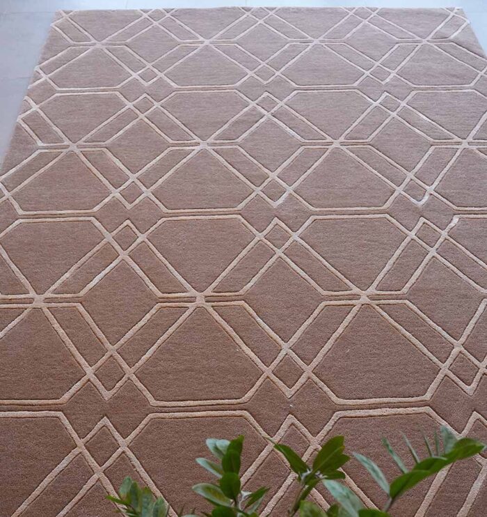 Elegant handmade silk rug in a stylish living room, from a top carpet store in Dubai, offering the finest rugs UAE.