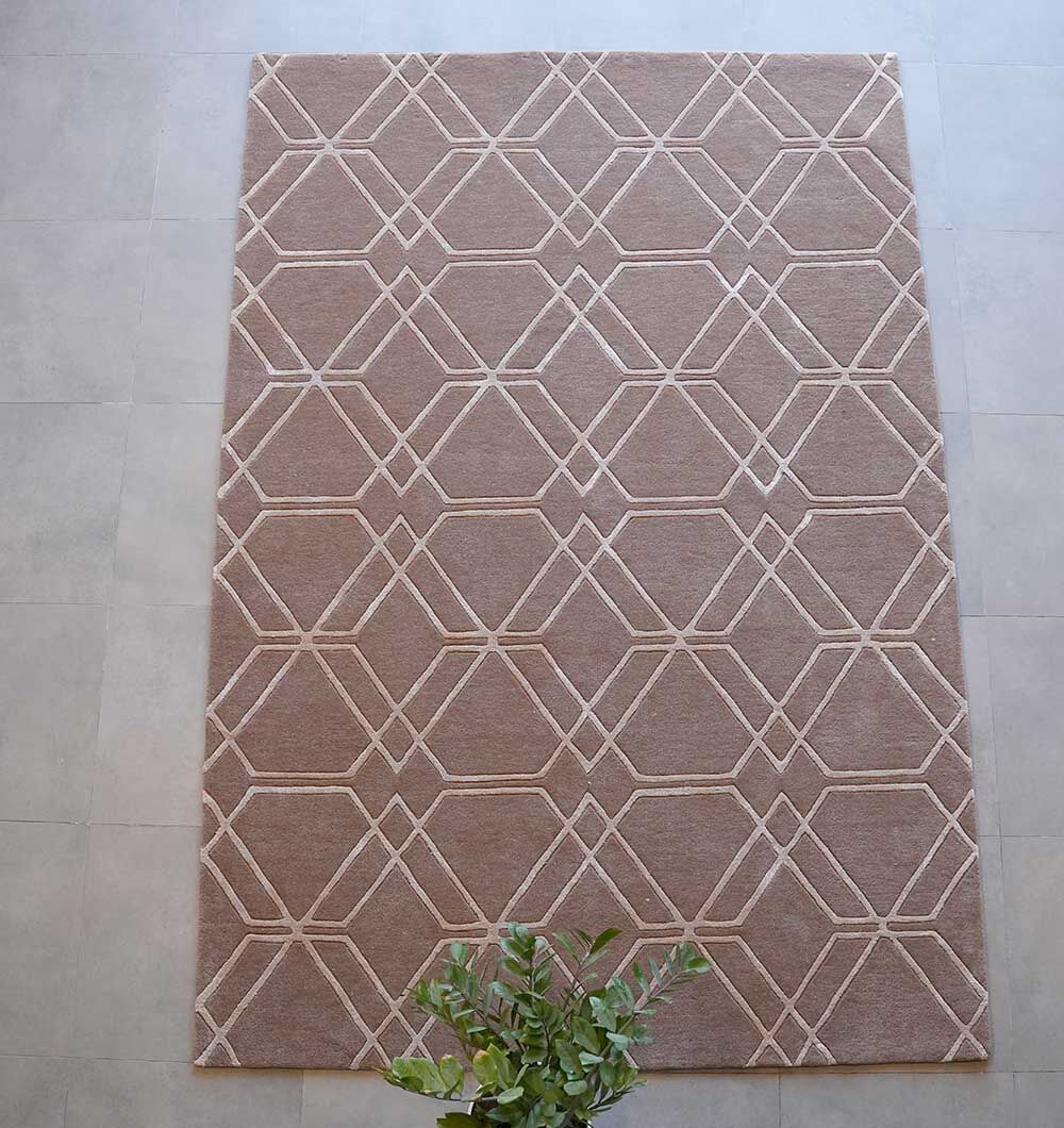 Handmade Silk Rugs & Tufted Carpets – Premium Carpet Store Dubai | Rugs UAE Elegant handmade silk rug in a stylish living room, from a top carpet store in Dubai, offering the finest rugs UAE.