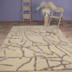 Luxurious handmade silk carpet displayed in a modern living room, available at the best carpet store in Dubai, offering premium rugs UAE.