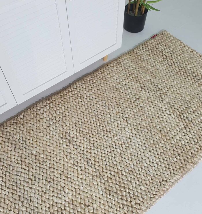 Side View of Hand-Woven Bleach Color Farmhouse Rug - Ramsha Home