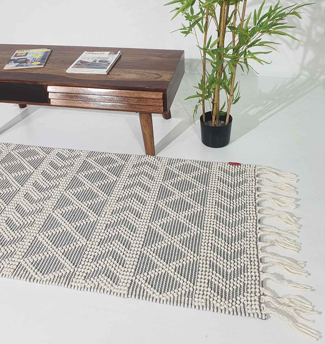 Masterpiece Woven Rug in Interior Room with Wooden Desk and Plant - Ramsha Home Masterpiece Woven Rug in Interior Room with Wooden Desk and Plant - Ramsha Home
