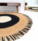 Handwoven braided jute rug highlighting natural texture, strength, and timeless rustic appeal