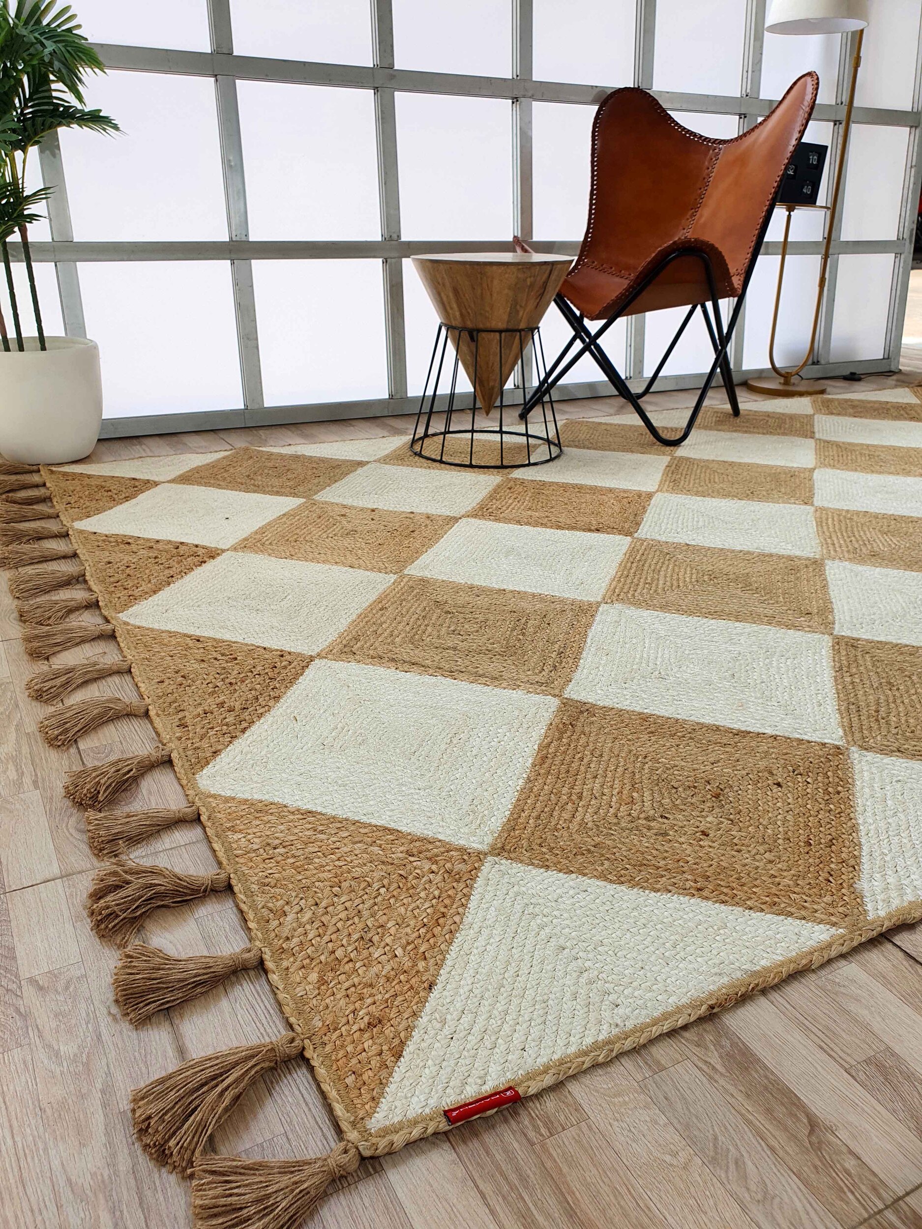 Elegant Handmade Braided Jute Floor Rug with Tassel in Natural & Bleach Colors - BR 031 (200x300cm) by Ramsha Home Elegant handmade braided jute floor rug with tassel in natural & bleach colors - BR 031 (200x300cm) by Ramsha Home