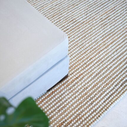 Hand woven wool hallway rug from India, stylish bohemian woven rug for homes in UAE and Dubai.