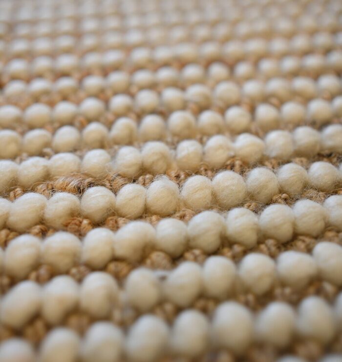 Hand woven wool hallway rug from India, stylish bohemian woven rug for homes in UAE and Dubai.