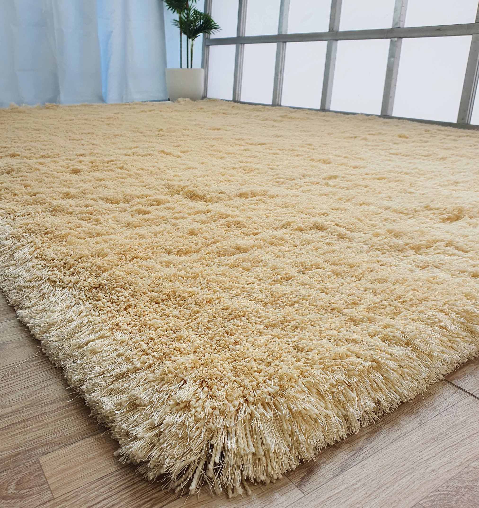 Detailed Side Profile: Close-up of Beige Shaggy Rug - Ramsha Home Close-up of Beige Handmade Shaggy Rug - Ramsha Home