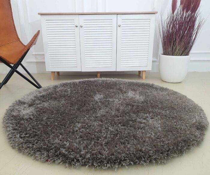 Sideways View of SG-05 Shaggy Rug in Grey with Cabinet, Vase, and Chair - Ramsha Home