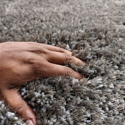 Hand Feeling the Smooth Texture of SG-05 Shaggy Area Rug in Grey - Ramsha Home