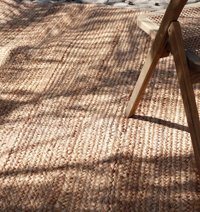 Handcrafted natural jute rug for living rooms, outdoor patios, and modern homes in UAE.