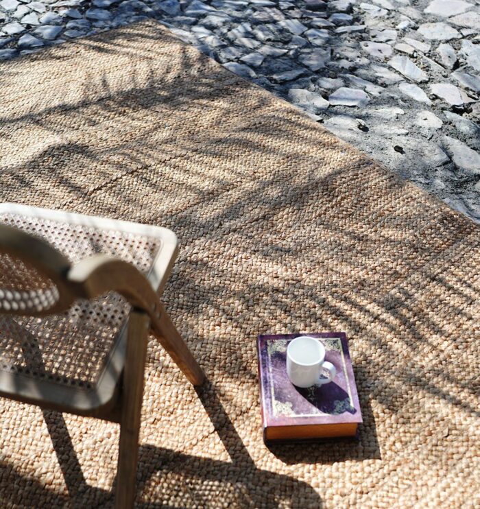 Handcrafted natural jute rug for living rooms, outdoor patios, and modern homes in UAE.