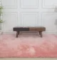 Soft shaggy rug with plush texture, modern design, and cozy comfort for home décor.