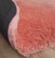 Shaggy rug with fluffy texture, soft feel, and modern design for cozy home interiors.