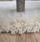 Soft shaggy rug with plush texture, cozy comfort, and stylish design for modern home décor.