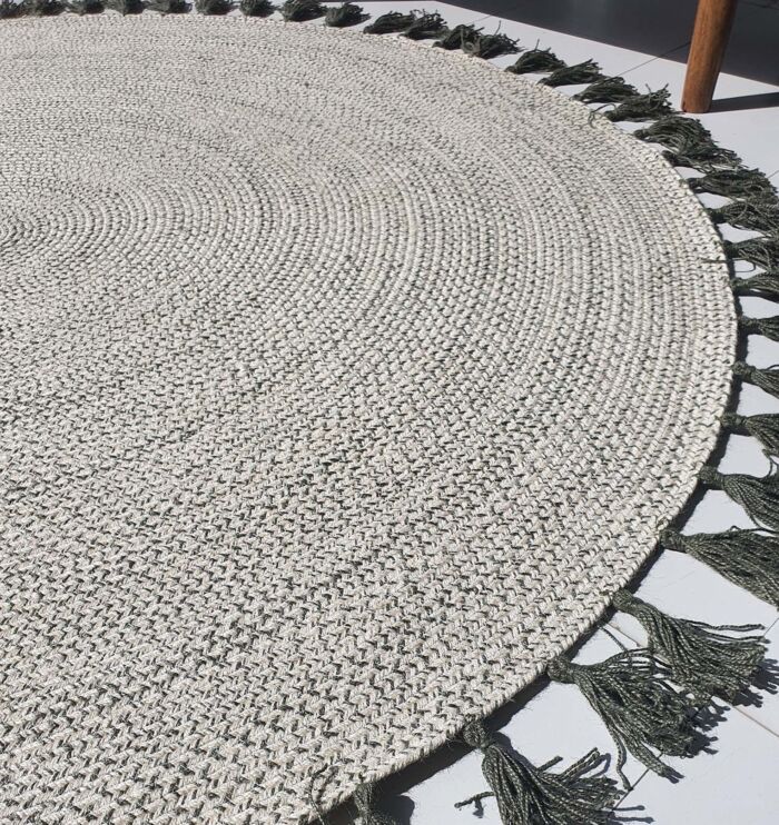 Side Close-up of Green and White Braided Circular Rug - Ramsha Home