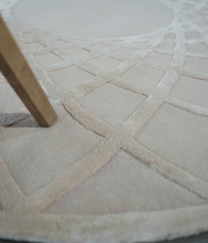 Luxury handmade rug Dubai, circular tufted carpet for living room and bedroom, stylish rugs UAE home décor.