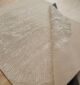 Handmade rug highlighting exquisite weaving, artisanal craftsmanship, and timeless elegance