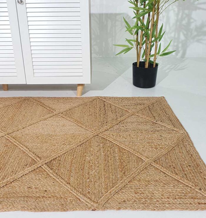 Handmade jute rug living room setting, showcasing artisanal craftsmanship and natural textures