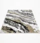 Durable machine-made rug with modern patterns, soft finish, and versatile design for home décor.