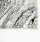 Durable machine-made rug with modern patterns, soft finish, and versatile design for home décor.