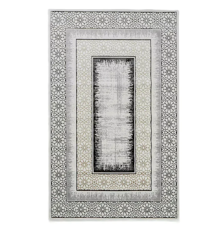 Durable machine-made rug with modern patterns, soft finish, and versatile design for home décor.