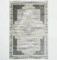 Durable machine-made rug with modern patterns, soft finish, and versatile design for home décor.