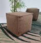 Versatile 40x40x40cm natural color jute pouf PF-134, ideal for enhancing comfort and style in various home settings by Ramsha Home.