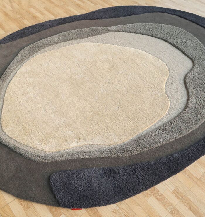 Handmade rug highlighting exquisite weaving, artisanal craftsmanship, and timeless elegance