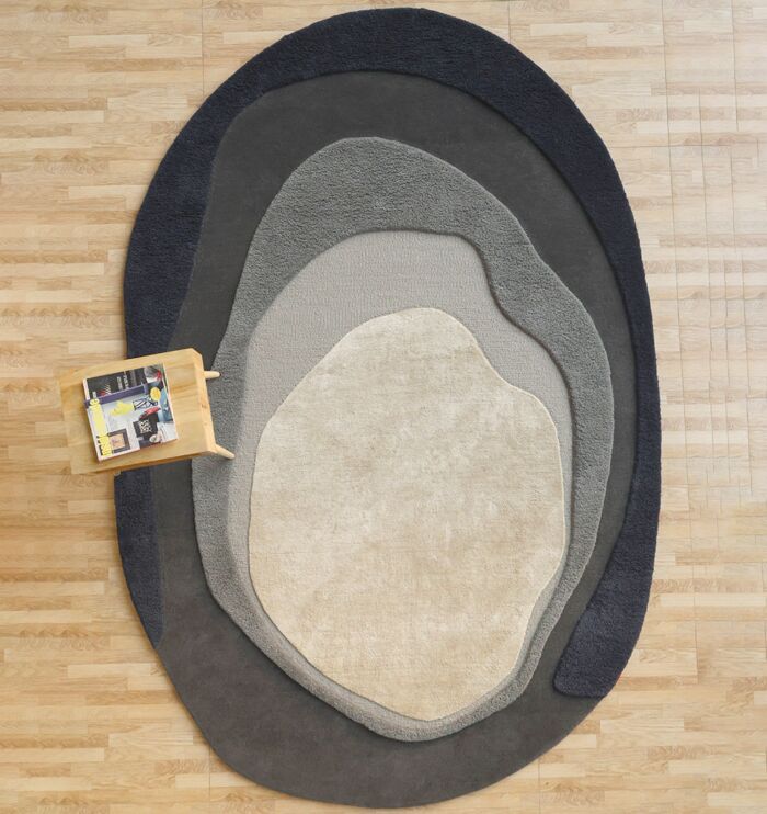 Handmade rug highlighting exquisite weaving, artisanal craftsmanship, and timeless elegance