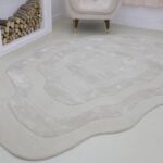 Handmade rug highlighting exquisite weaving, artisanal craftsmanship, and timeless elegance