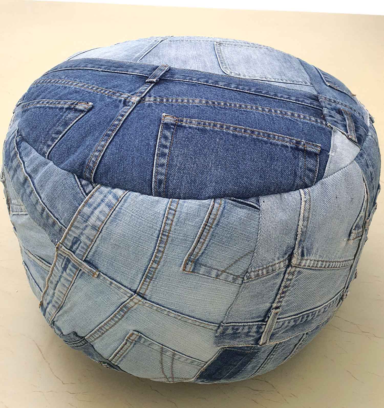 Denim blue color pouf, PF 144-B, featuring a sleek, modern design perfect for versatile home decor. Denim blue color pouf, PF 144-B, featuring a sleek, modern design perfect for versatile home decor.