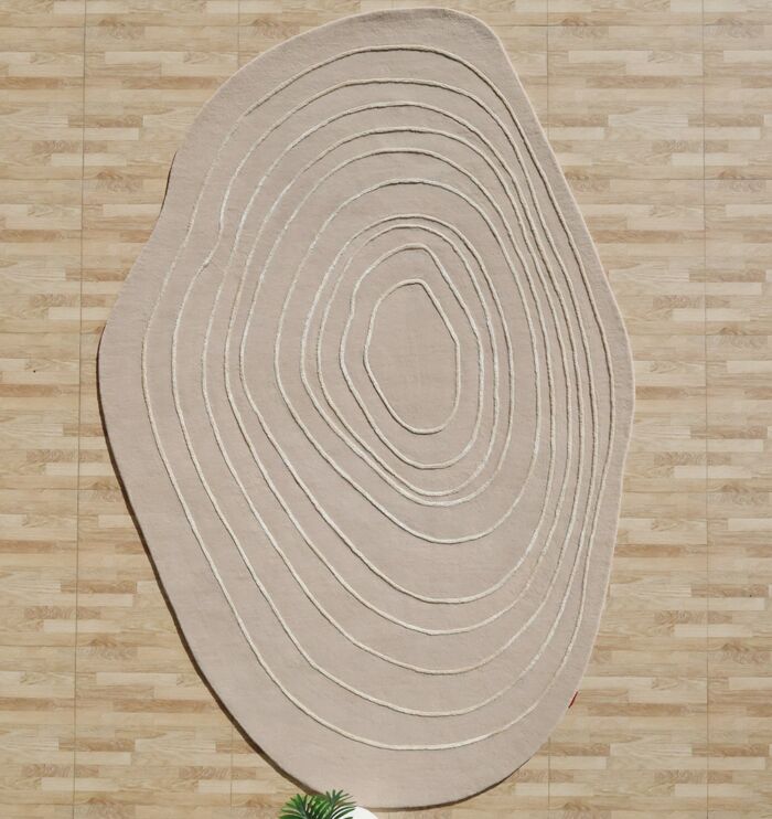 Handmade rug showcasing craftsmanship, rich texture, and timeless style.