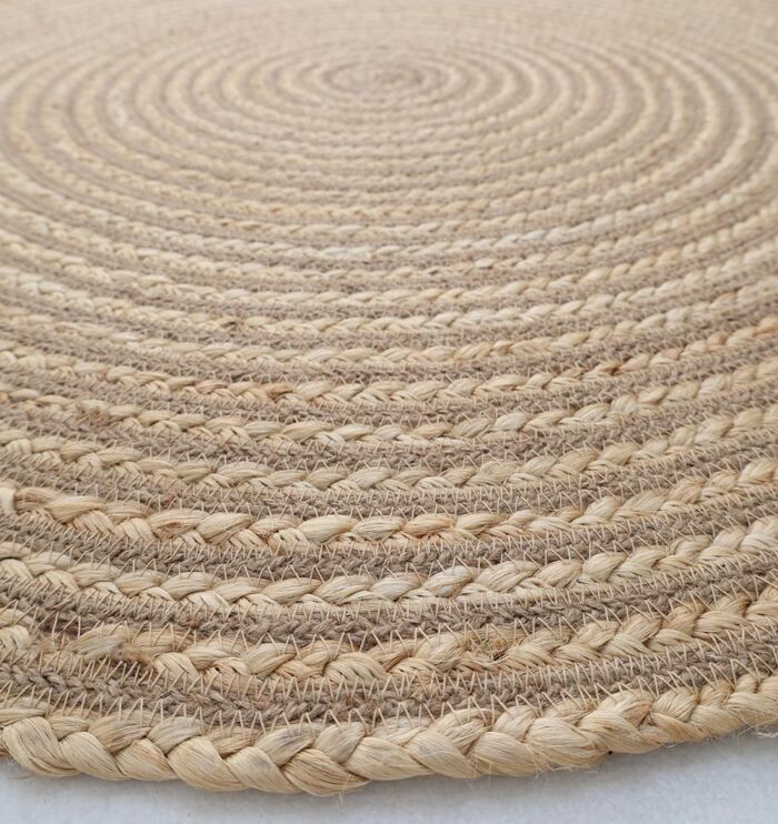 Handmade braided rug for rustic interiors, rugs Dubai, outdoor rugs, and dining table rugs UAE