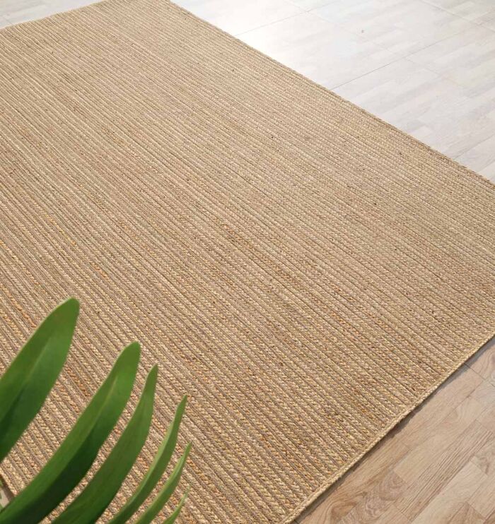 Handmade braided rug for stylish interiors, rugs Dubai, outdoor rugs, and dining table rugs