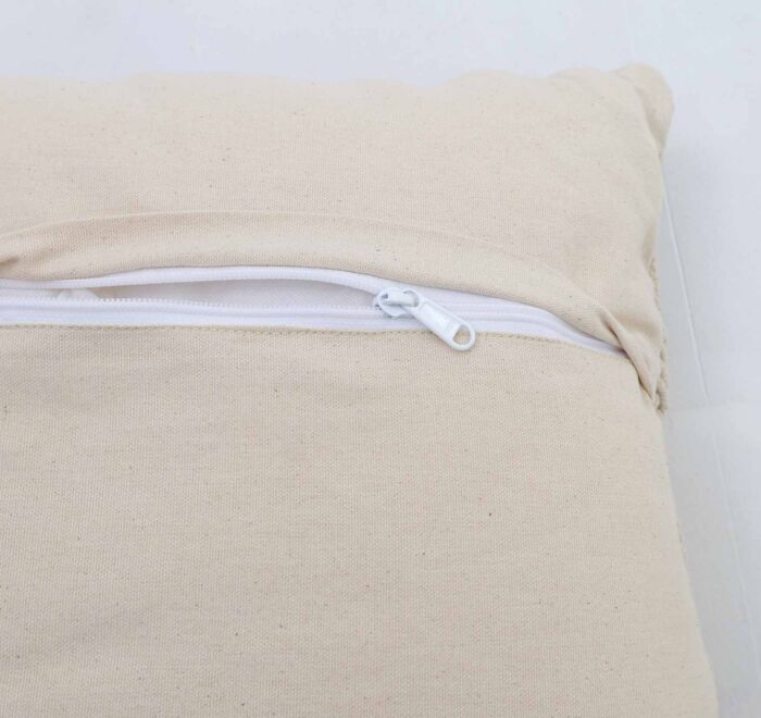 White decorative cushion with soft fabric and elegant design